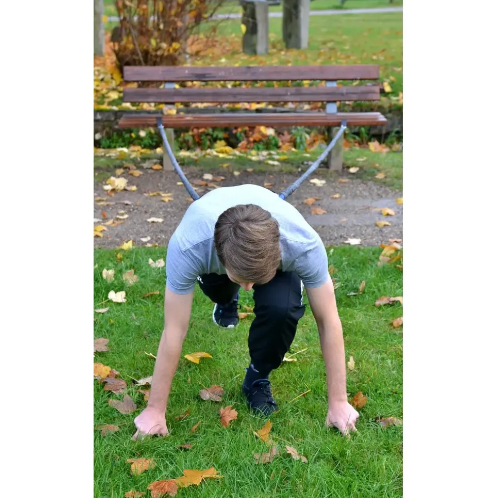 Sprinttrener med motstandsbånd